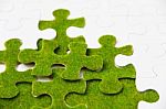 Green Puzzle Piece Concept Stock Photo