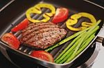 Grilled  Steak On Grill Pan Stock Photo