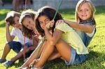 Group Of Childrens Having Fun In The Park Stock Photo
