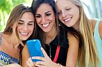 Group Of Friends Having Fun With Smartphones Stock Photo