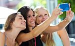 Group Of Friends Taking Selfie In The Street Stock Photo