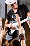 Guitarist Playing For His Fans Stock Photo