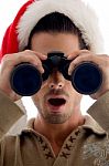 Guy Looking Through Binoculars Stock Photo