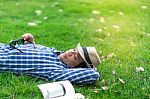 Half Length Man Relaxing And Sleeping In Park Stock Photo