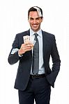 Half Lenth Portrait Of A Businessman Smiling In Falling Money Stock Photo