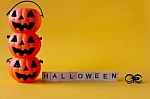 Halloween Jack O Lantern Bucket With Halloween Word On Yellow Ba Stock Photo