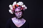 Halloween Makeup With Rhinestones And Wreath Of Flowers Stock Photo
