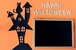 Halloween Word With Chalkboard And Haunted House Castle And Black Cat  On Orang Stock Photo