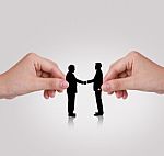 Hand And Silhouettes Stock Photo