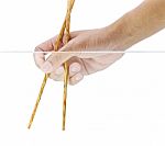 Hand Holding Chopstick Stock Photo