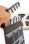 hand holding clapperboard Stock Photo