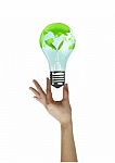 Hand Holding Litgh Bulb . Concept Love The Earth Stock Photo