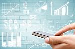 Hand Holding Smart Phone With Drawing Business Plan Concept Stock Photo