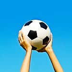 Hand Holding Soccer Ball Stock Photo