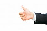 Hand Keeping Thumb Up Stock Photo