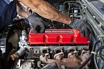 Hand Repair And Maintenance Cylinder Diesel Engine Of Light Pick Stock Photo