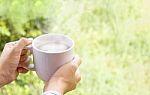 Hands Hold Big Cup Of Hot Black Coffee In Happily Morning Relax Stock Photo