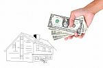 Hands With Money And Miniature House Stock Photo