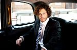 Handsome Business Corporate Inside Taxi Stock Photo