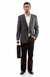 Handsome Businessman Standing With His Office Bag Stock Photo