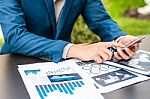 Handsome Businessman Wearing Suit And Using Modern Laptop Outdoo Stock Photo