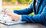 Handsome Businessman Wearing Suit And Using Modern Laptop Outdoo Stock Photo