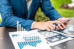 Handsome Businessman Wearing Suit And Using Modern Laptop Outdoo Stock Photo