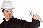 Handyman Wearing Uniform And Hardhat Stock Photo