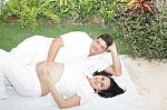 Happy Beautiful Pregnant Woman With His Husband Outdoors Stock Photo
