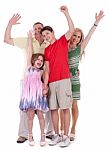Happy Family Raising Their Hands And Having Fun Stock Photo