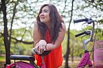 Happy Fatty Woman Posing With Bicycle Stock Photo