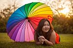 Happy Fatty Woman With Umbrella Stock Photo