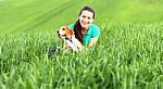Happy Girl With Beagle Dog Stock Photo