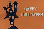 Happy Halloween  With Haunted House Castle And Black Cat On Oran Stock Photo