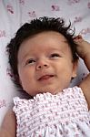 Happy Infant In Crib Stock Photo