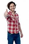 Happy Man Giving Thumbs Up Sign Stock Photo