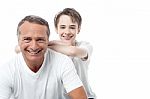 Happy Mature Father And Son Posing Stock Photo