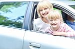 Happy Mother And Daughter In Car Stock Photo