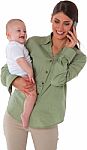 Happy Mother Carrying Son While Using Mobile Phone Stock Photo