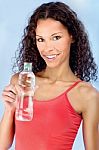 Happy Woman And Bottle Of Water Stock Photo