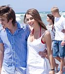 Happy Young Couples Walking At The Beach Stock Photo