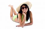 Happy Young Girl With Hat And Green Bikini Stock Photo