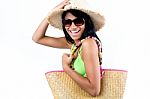 Happy Young Girl With Hat And Green Bikini Stock Photo