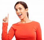 Happy Young Woman Pointing Up Stock Photo