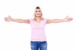 Happy Young Woman With Arms Open Stock Photo