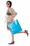 Happy Young Woman With Shopping Bags On White Stock Photo