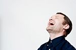 Hard Laughing Middle Aged Man Stock Photo
