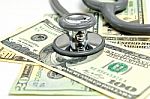 Heap Of Dollars With Stethoscope Stock Photo