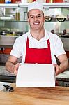 Here Is The Pizza You Ordered! Stock Photo