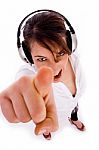 High Angle View Of Cheerful Woman Listening To Music In Headphon Stock Photo